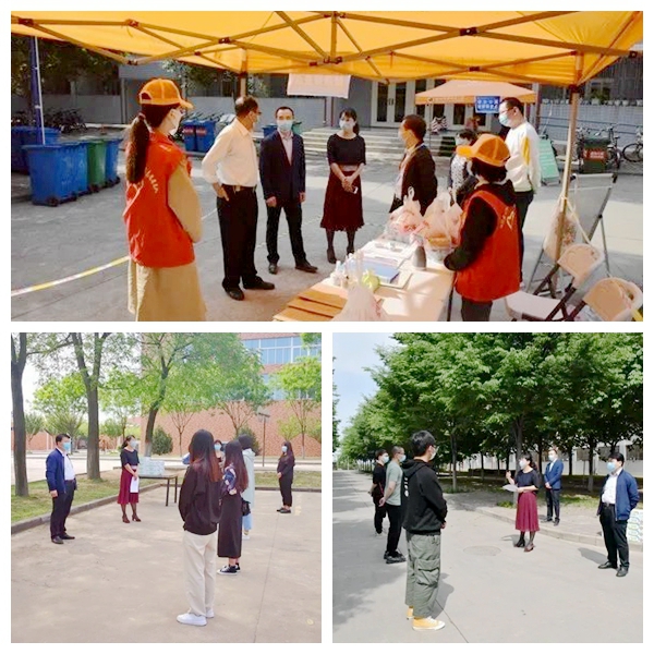 9912707f537a49049a6bc57d7497dc78.jpg 院领导看望值班志愿者及返校学生.jpg